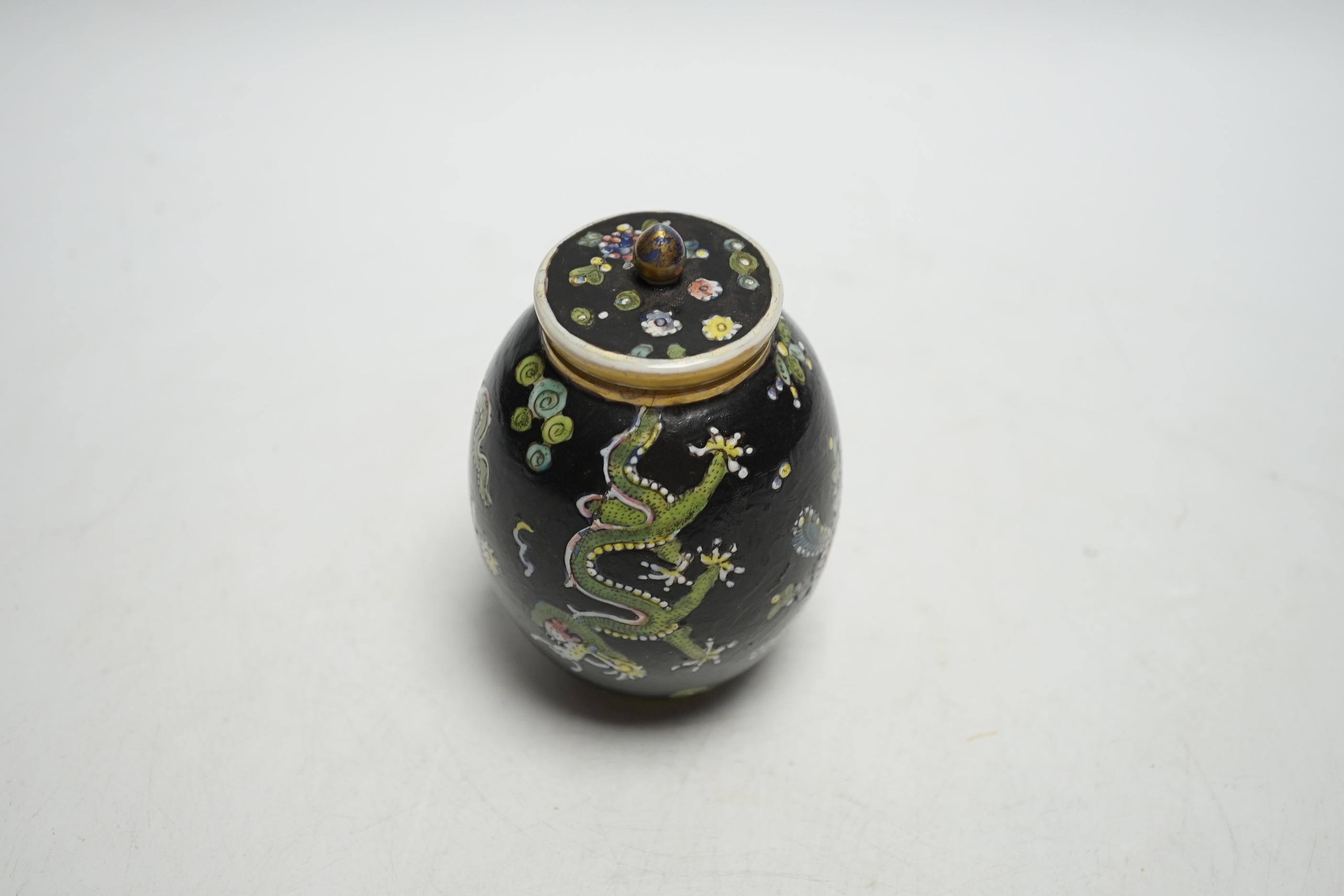 A Chinese Kangxi clobbered dragon jar and cover, 10cm high